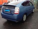 Автомобиль Toyota Prius - хэтчбек фото