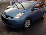 Автомобиль Toyota Prius - хэтчбек фото
