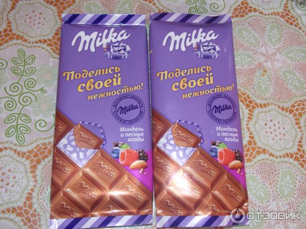 Молочный шоколад Milka с двухслойной начинкой Миндаль и Лесные ягоды фото