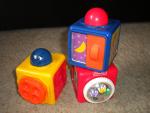 Кубики с сюрпризами Fisher-Price фото
