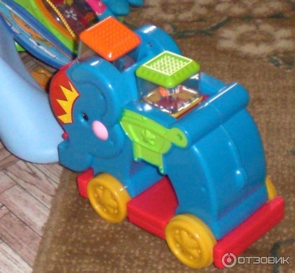 Слоник-каталка Fisher Price фото