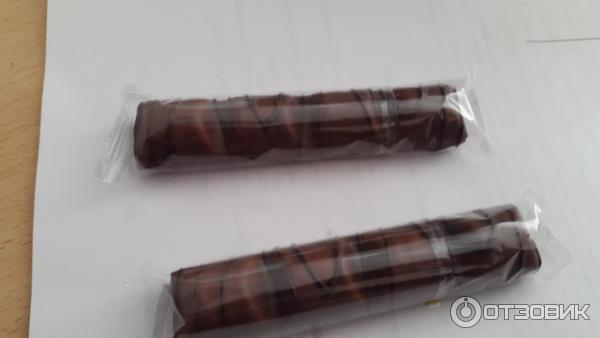 Вафли Kinder bueno покрытые молочным шоколадом с молочно-ореховой начинкой фото