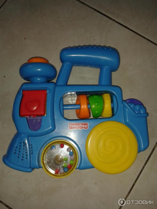 Музыкальный паровозик Fisher Price фото