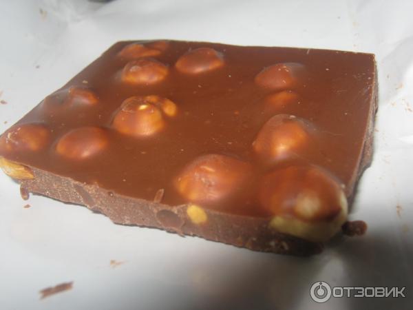 Молочный шоколад Milka С целым лесным орехом фото