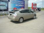 Автомобиль Toyota Prius - хэтчбек фото