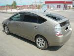 Автомобиль Toyota Prius - хэтчбек фото
