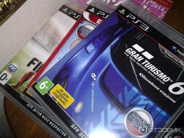 Игровая приставка Sony PlayStation 3 (PS3) Super Slim фото