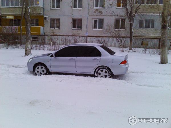 Автомобиль Mitsubishi Lancer IX седан фото