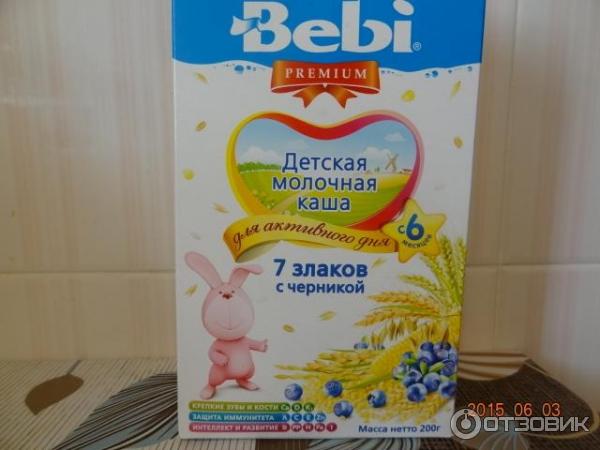 Детская молочная каша Bebi Премиум 7 злаков с черникой фото