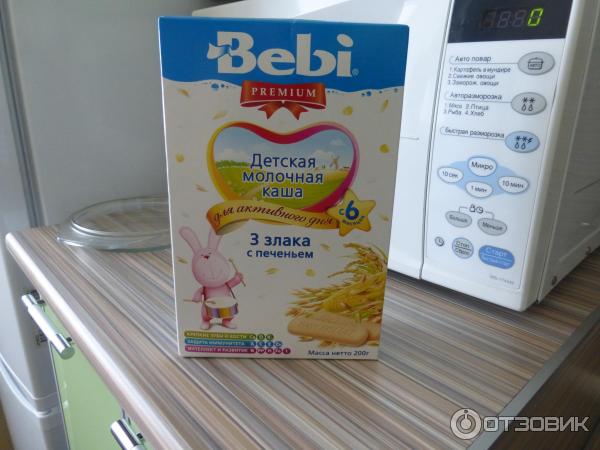 Каша молочная Bebi Premium 3 злака с печеньем фото