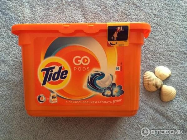 Средство для стирки белья Tide гель-капсулы фото