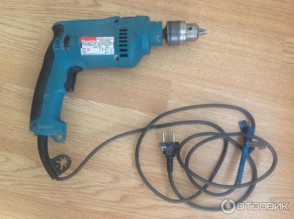 Дрель ударная Makita HP1620 фото