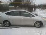 Автомобиль Toyota Prius - хэтчбек фото