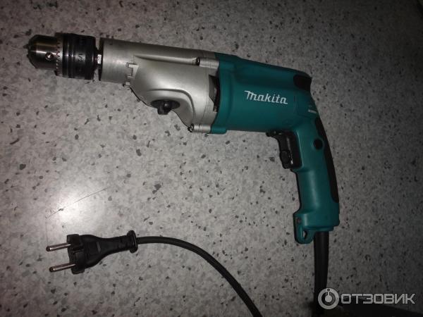 Дрель ударная Makita HP2051F фото